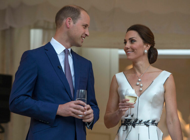 Prince William and Kate Middleton smiling at each other